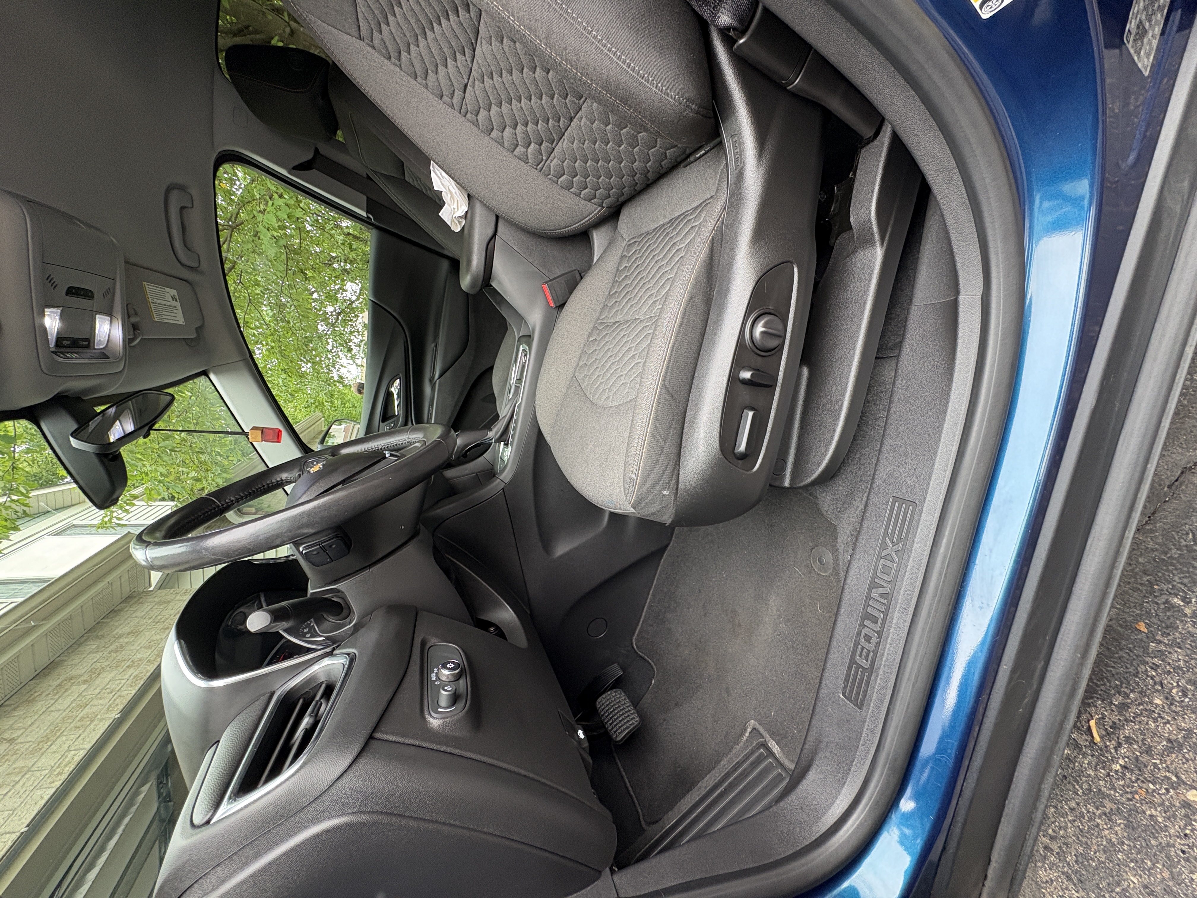 Professional car interior detailing result showing clean seats and dashboard